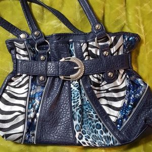 5/$25! Multiple blue purse with animal print